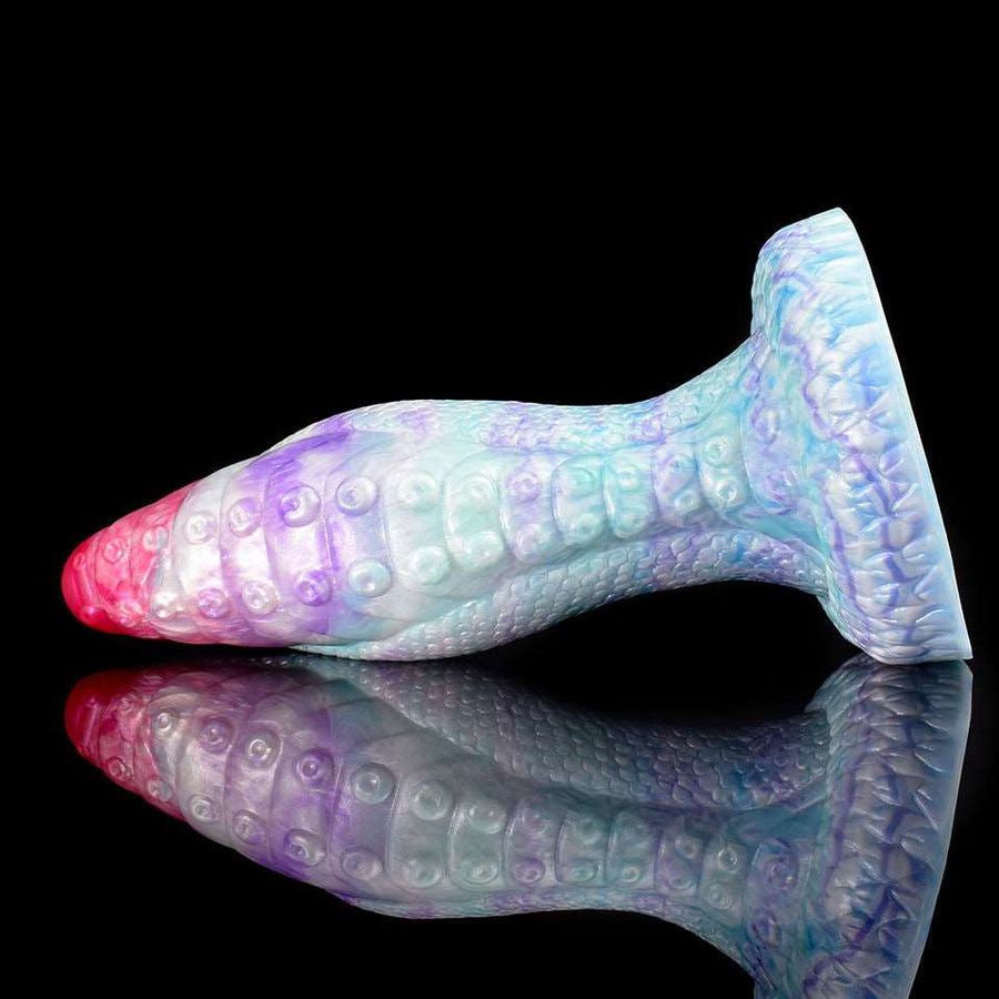 Iridescent octopus-shaped butt plug, side view, pink tentacle tip, textured suckers
