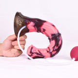 Squirting minotaur dildo side view, black-red marbled, white tube loop attached