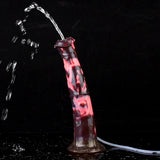 Squirting minotaur dildo spraying stream, black-red marbled body, white tube