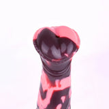 Minotaur dildo head close-up, glossy black-red marbled, circular opening