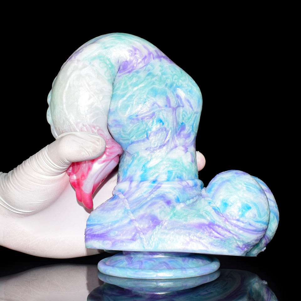 Huge-knot minotaur dildo, pastel marbled blue and purple with pink insert opening.