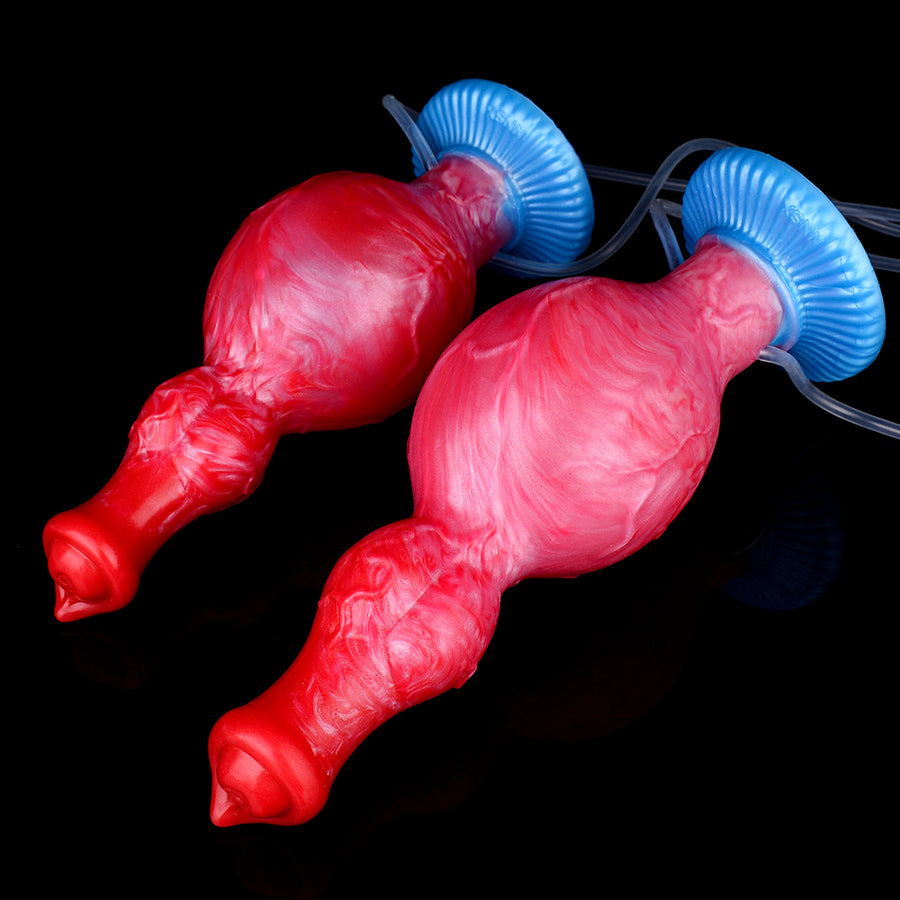 Two inflatable red/pink sex toys with blue ring bases and air tubes