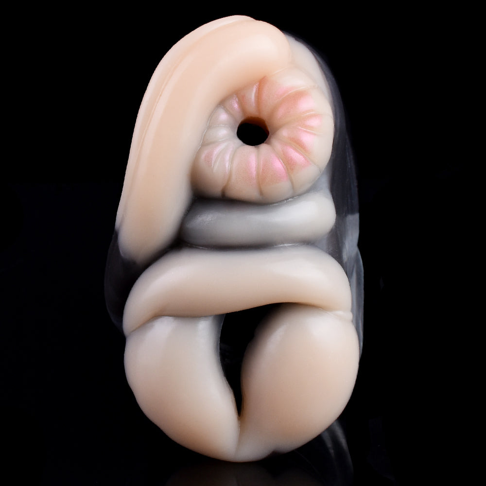 Close-up of the two openings on the gray plush giraffe masturbator