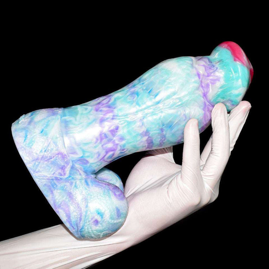 Glacitaur plush-style butt plug with huge knot, pastel marbled body and rounded pink tip