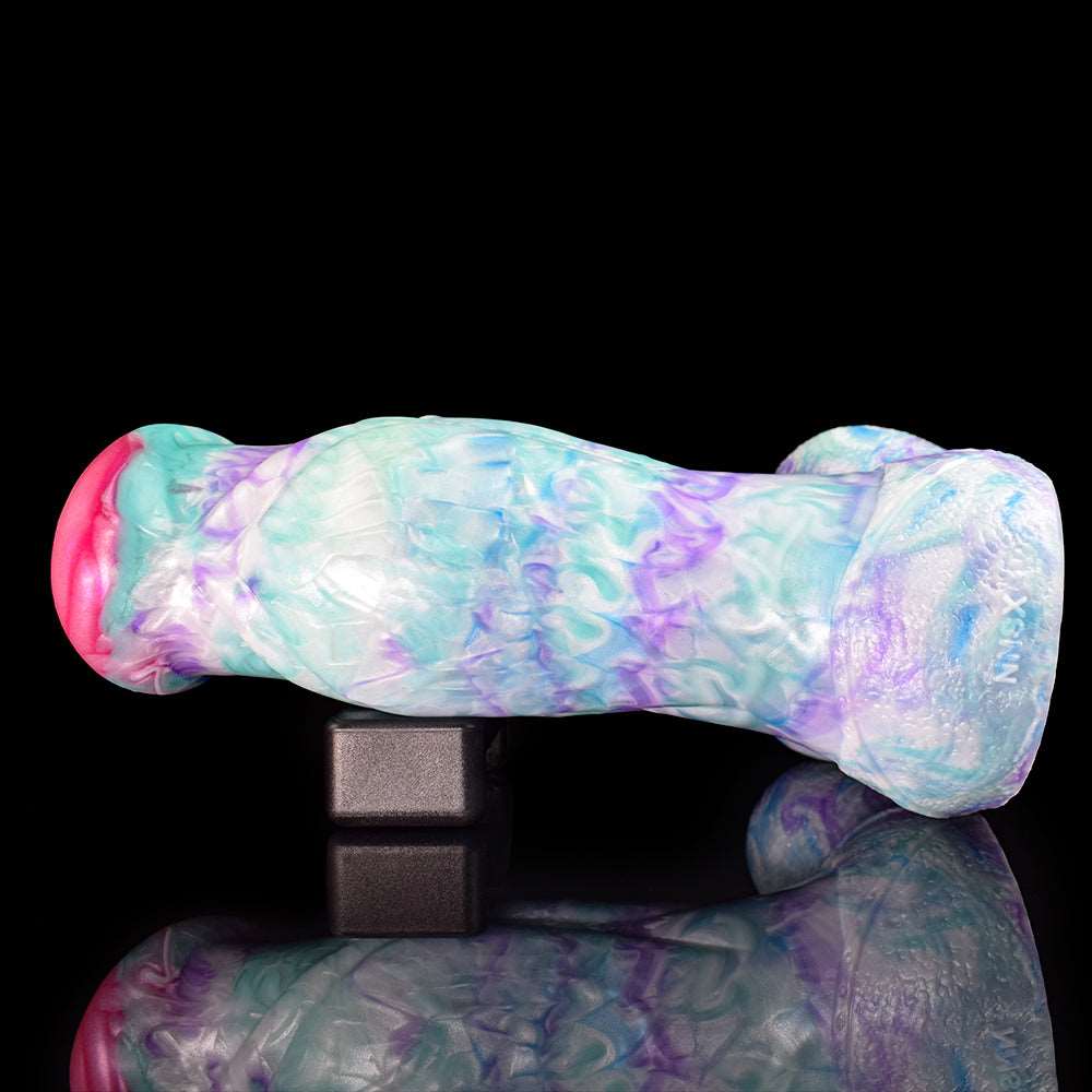 Pastel blue and purple plug with curved form and wide flared end