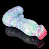 Side view of pastel blue dildo/plug with sculpted knot and pink tip
