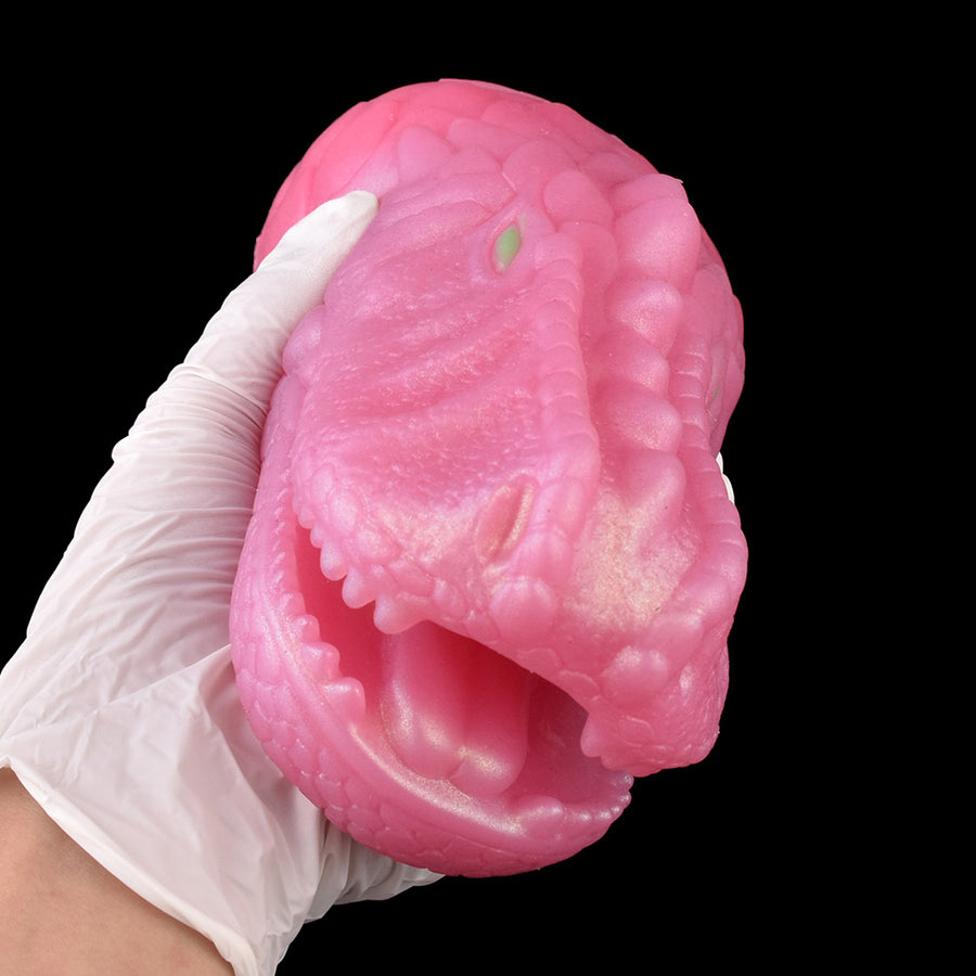 Pink dragon-muzzle fantasy masturbator with white glove-like base