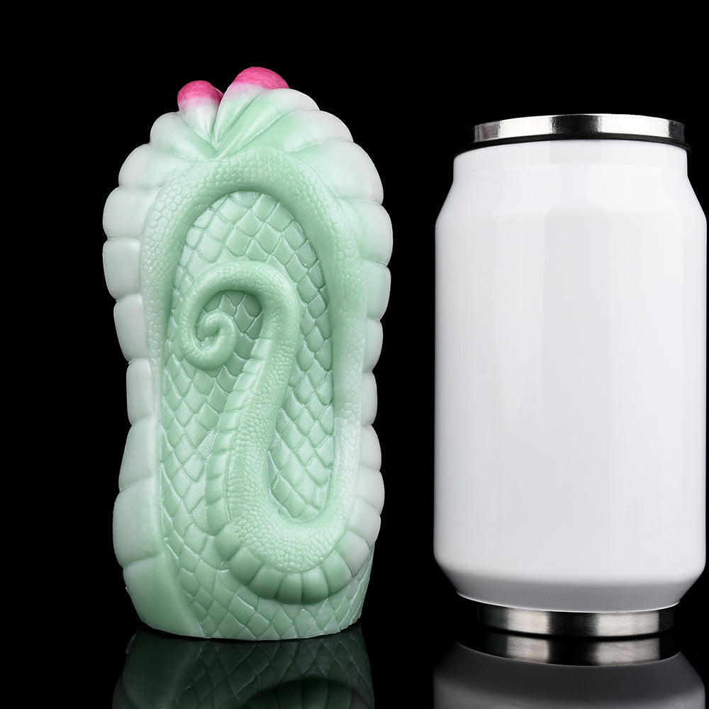 Green serpent fantasy fleshlight sleeve with pink tip and scaly texture; white bottle