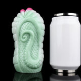Green serpent fantasy fleshlight sleeve with pink tip and scaly texture; white bottle
