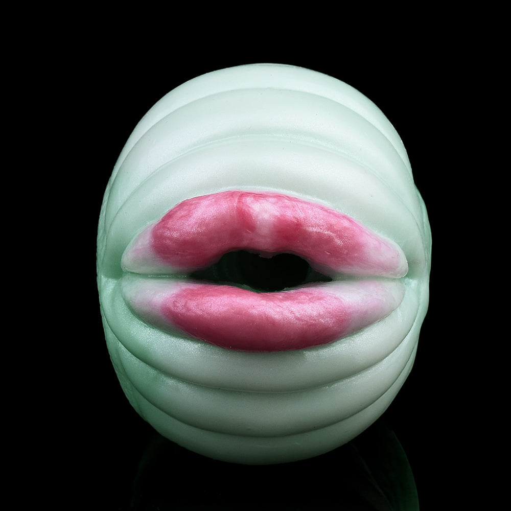 Green serpent mouth-shaped opening with pink inner lips on textured sleeve