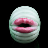 Green serpent mouth-shaped opening with pink inner lips on textured sleeve