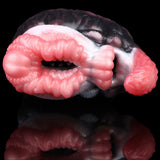 Dual-hole creature toy showing two pink ribbed inserts and black-and-white fur detail
