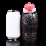Dual-hole creature masturbator, pink ridged head, dark furry body