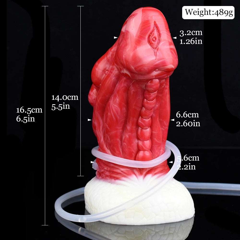 Red dragon anal plug with white base, upright full view