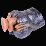 Dual-hole animal-themed fleshlight with an inserted sleeve and textured scaly exterior