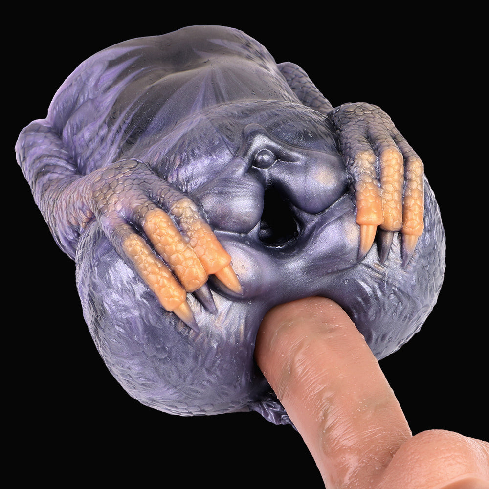 Purple-gray animal-themed dual-hole male masturbator, front opening with orange textured grips