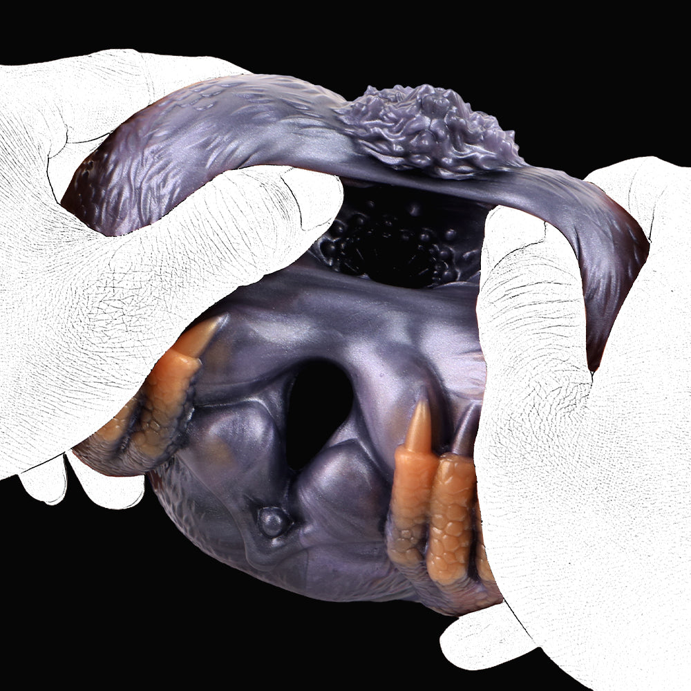 Dual-hole animal fleshlight held with gloved hands, showing the double opening area