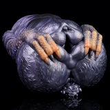 Front view of Gryphina dual-hole animal fleshlight, gray-purple body with orange ridges