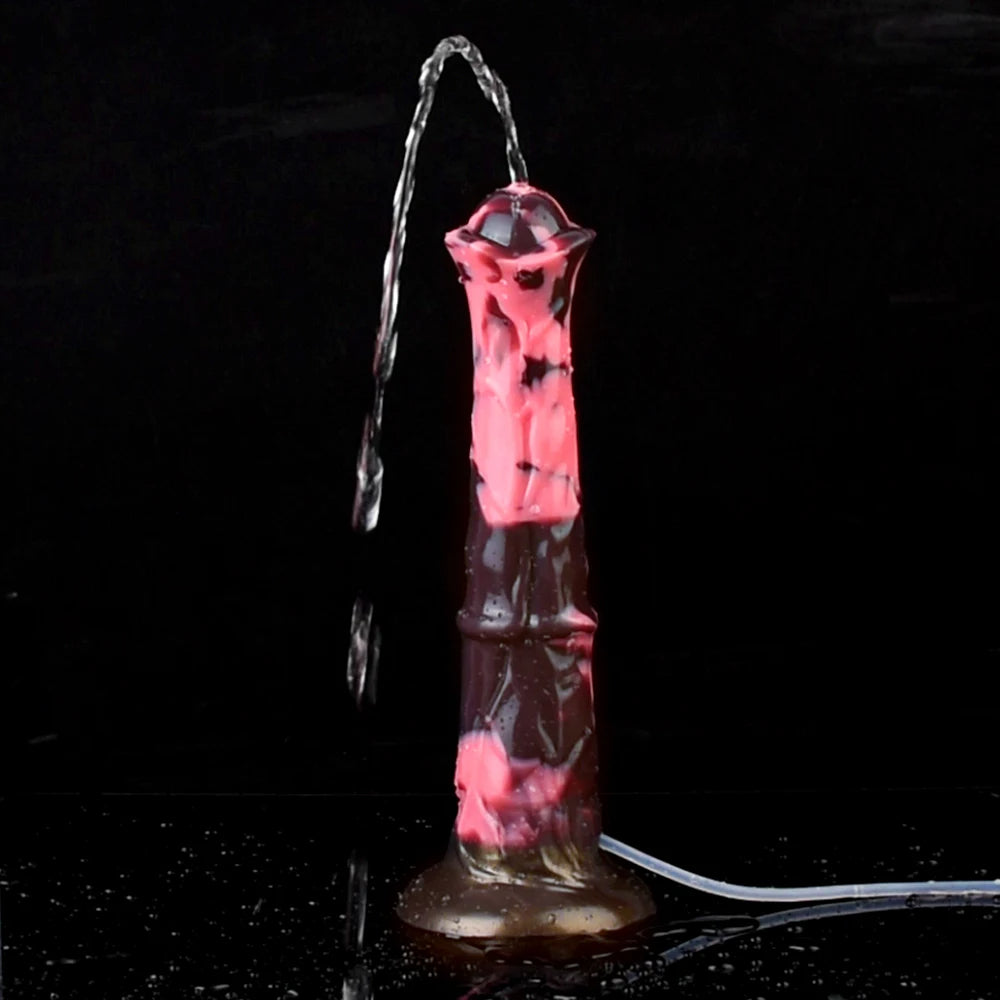 Horse-shaped dildo spraying fluid from nozzle, pink-and-dark marbled body