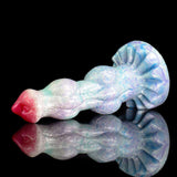 Fantasy minotaur-style dildo, pastel blue with red tip and double-knot base.