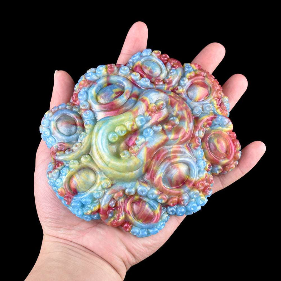 Octopus grinder sex toy, pastel blue, green, and pink textured tentacle details
