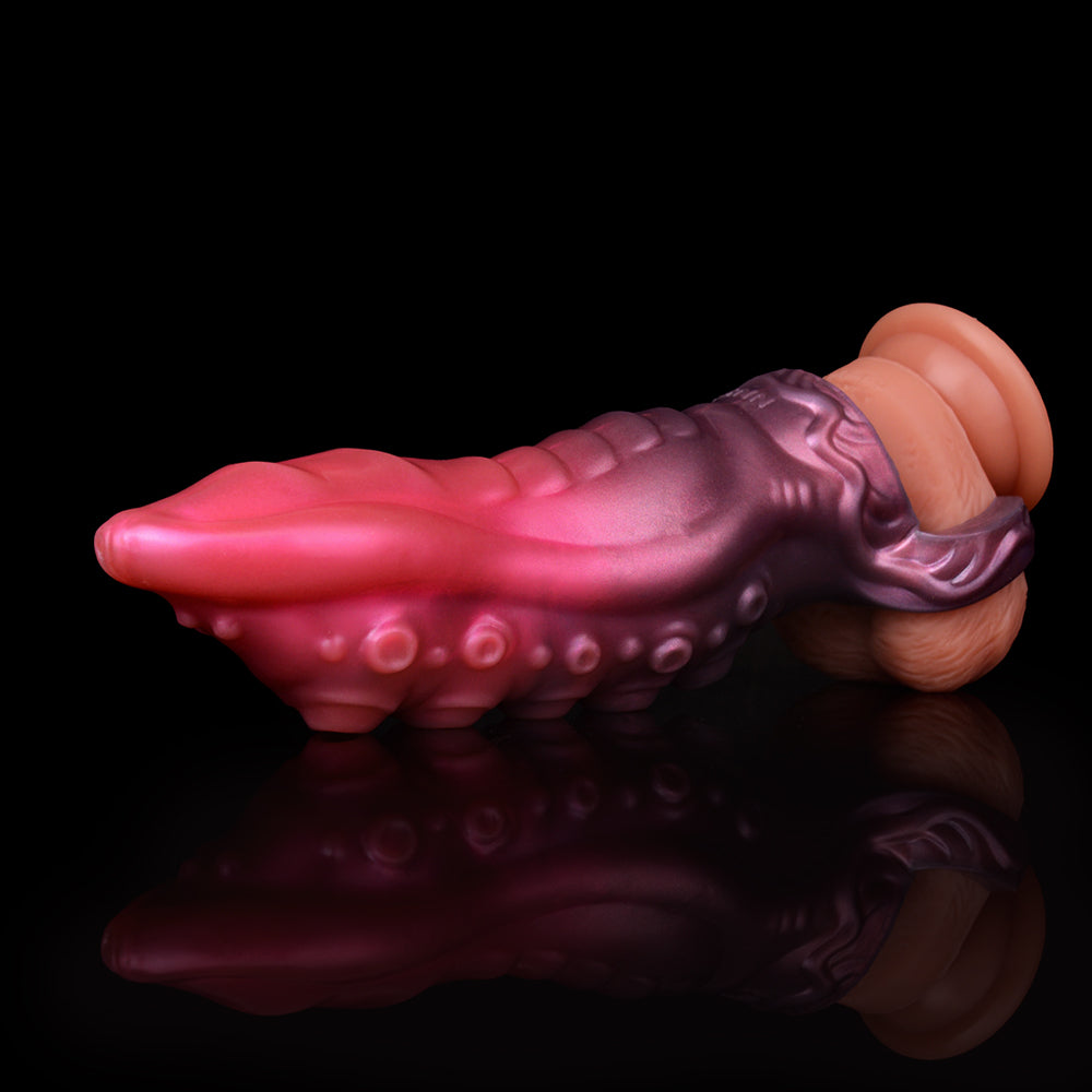 Pink octopus tentacle sheath in horizontal view with textured ridges and base.