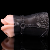 Horse muzzle sex toy with black harness straps and peach internal opening