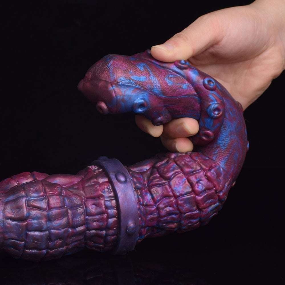 ICARIA dildo doble extremo, close-up de ambos extremos tipo tentáculo, textura morado-azul