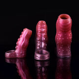 Octopus Tentakel Cock Sleeve, 3 Größen sichtbar, glänzend rosa mit runden Noppen, offene Spitze