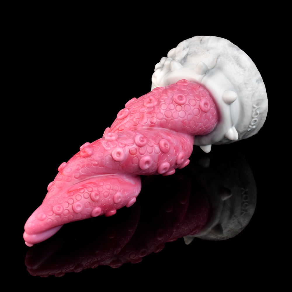 Pink octopus tentacle vibrator with curved tentacle shape and white base