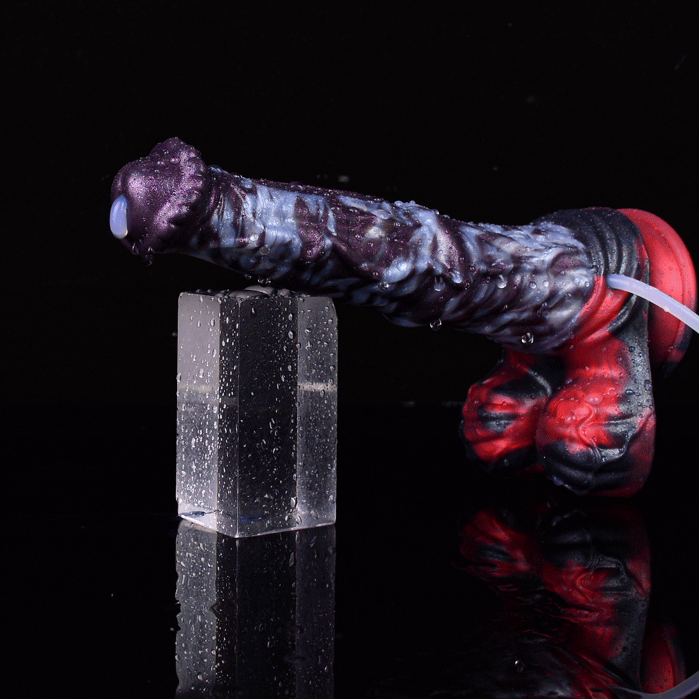 Spritzzubehör-Dildo seitlich, lila Struktur, roter Sockel, Schlauchanschluss