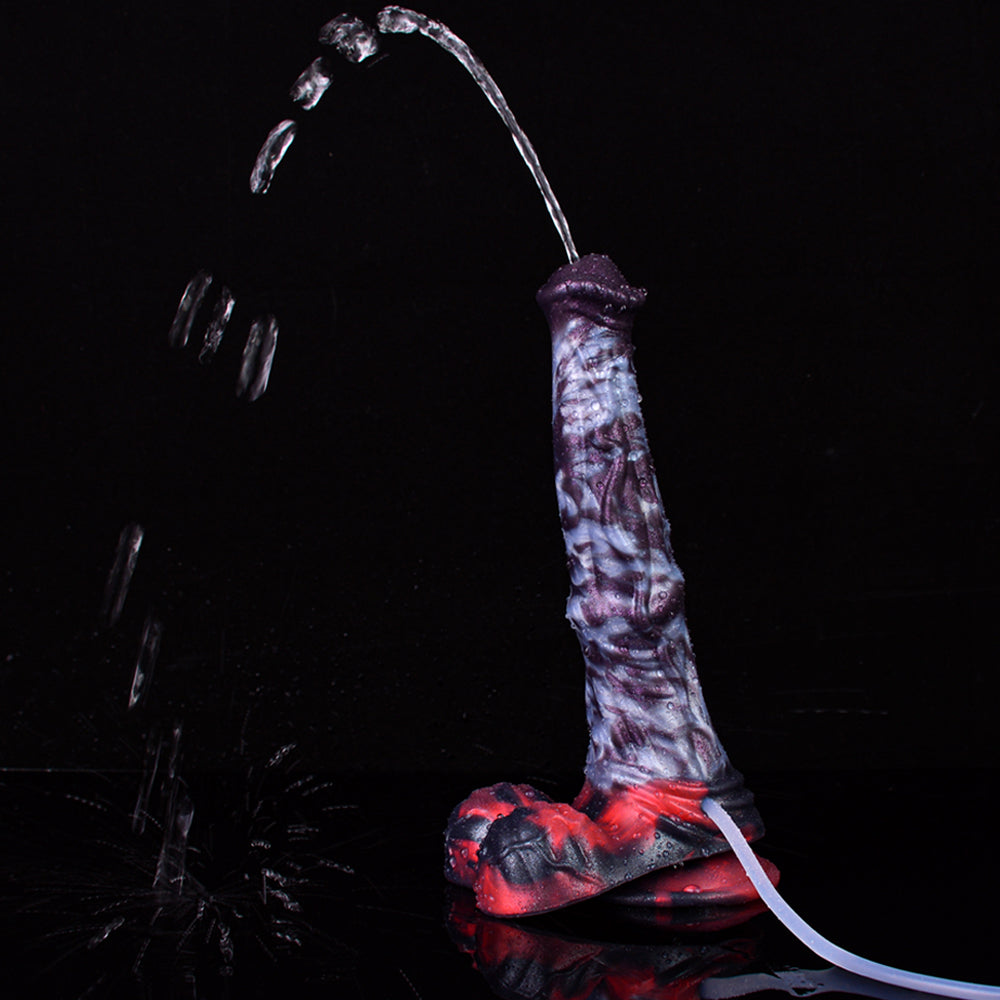 Spritzzubehör-Dildo spritzt, lila gemustert, Wassertröpfchen am Düsenauslass