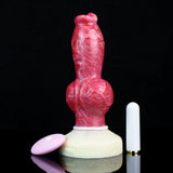 Red silicone dog-knot butt plug with cream base and white cylindrical remote