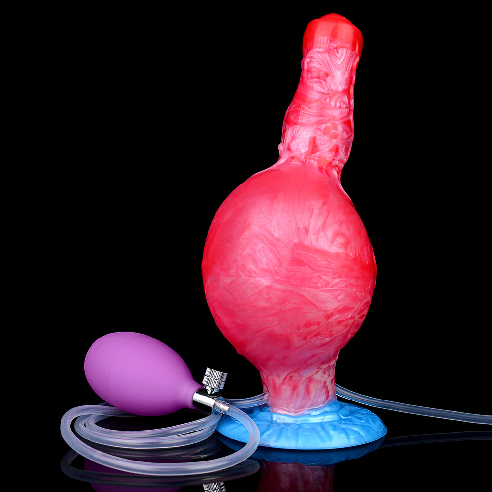 Inflatable fantasy-beast dog toy with purple pump bulb, red body and blue base