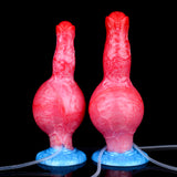 Two inflatable fantasy-beast dog toys, red bodies with blue bases and tubes
