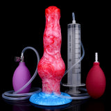Inflatable fantasy-beast dog toy with pump syringe, red body, blue base and tubing