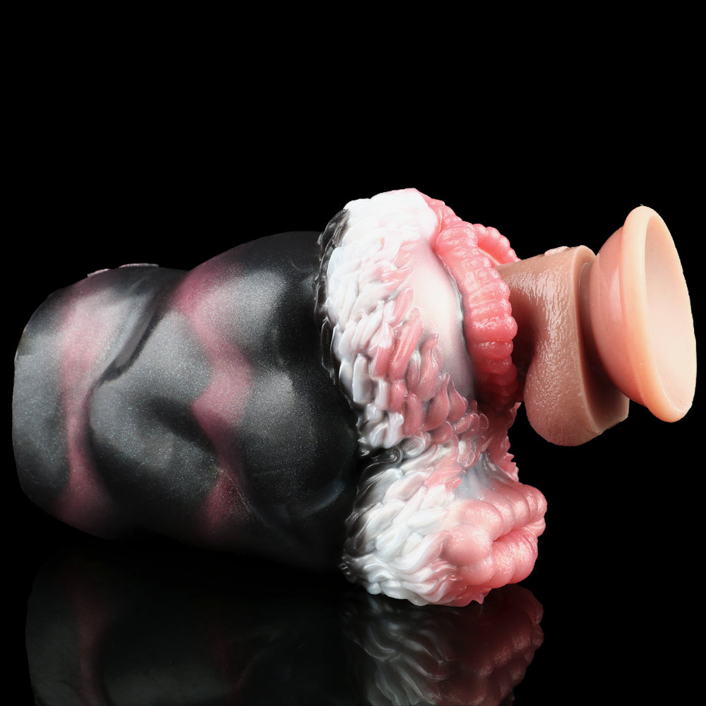 Dual-hole pocket masturbator end view with raised pink and white ridged texture