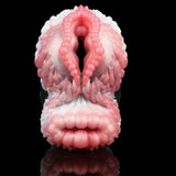 Back view dual-hole masturbator with looped central opening and pink/white texture