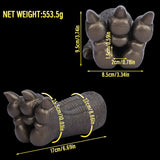 Bronze textured monster paw channel cover with three pointed claws