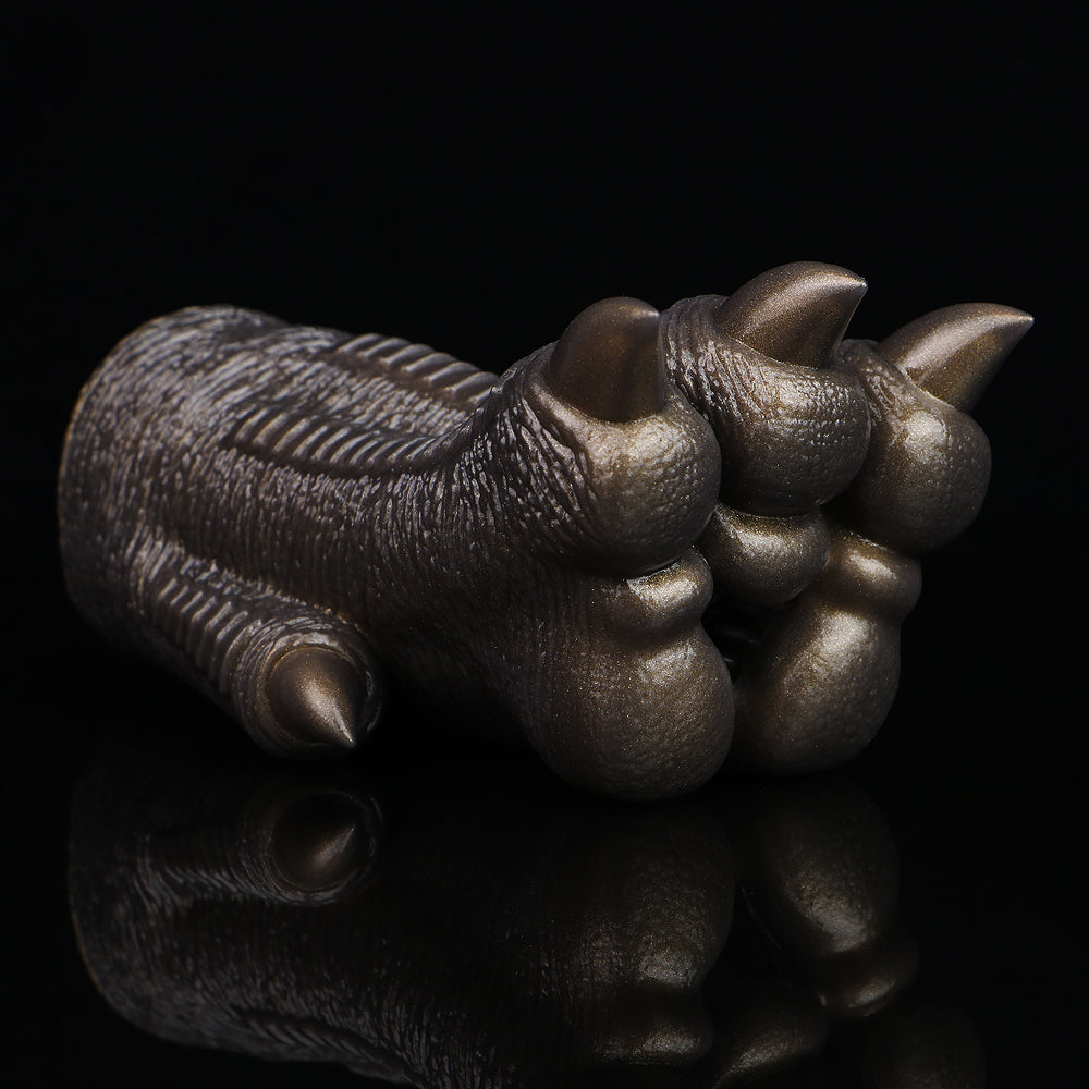 Bronze textured monster paw cover with ribbed pattern and rounded claw tips