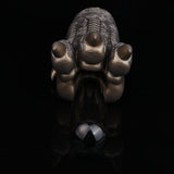 Bronze textured monster paw face with three rounded claws and black connector