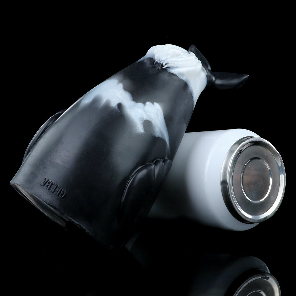 Killer Whale fleshlight, angled view with textured opening rim and dorsal details