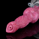 Pink textured dog dildo tip with circular opening