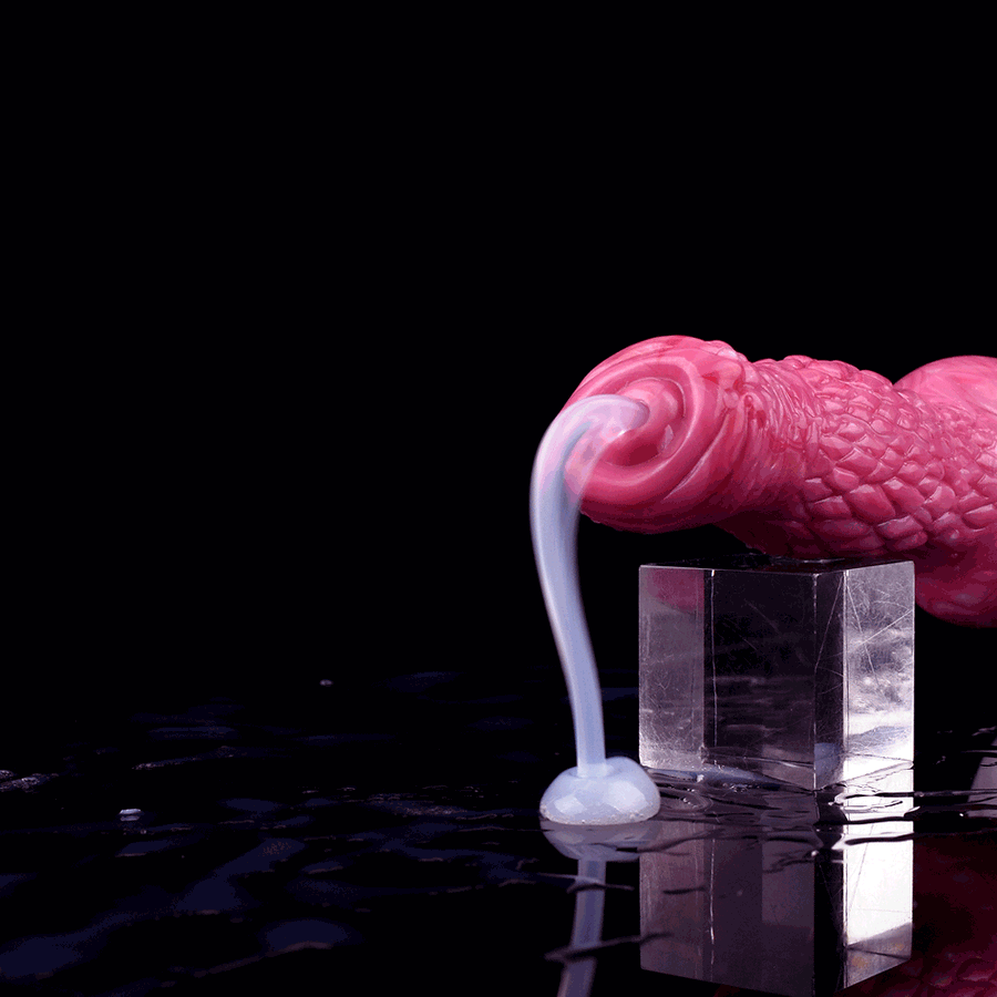 Pink dog-shaped dildo with clear tube and nozzle positioned over small container