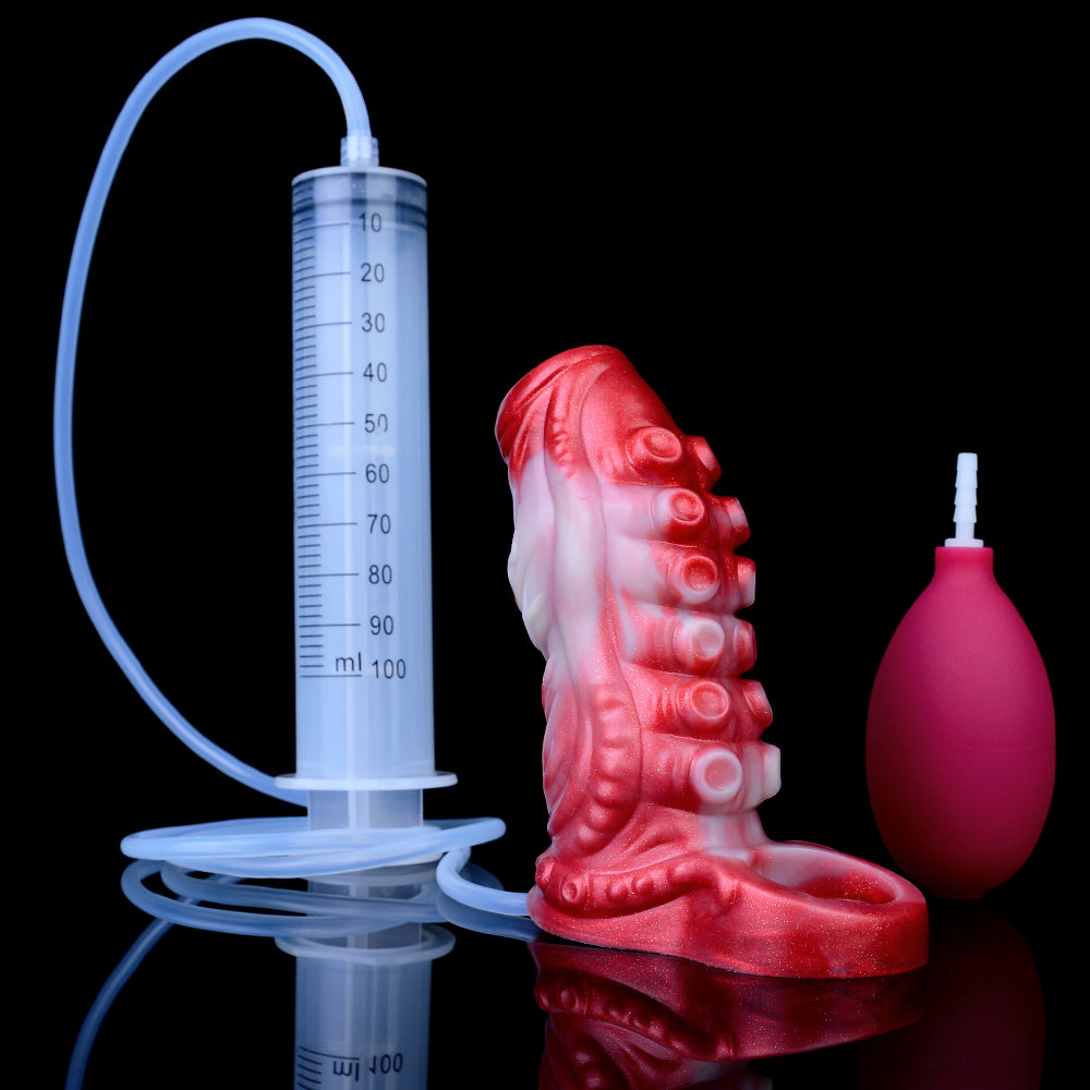 Red tentacle penis sleeve with squeeze bottle and clear tubing hose for squirting