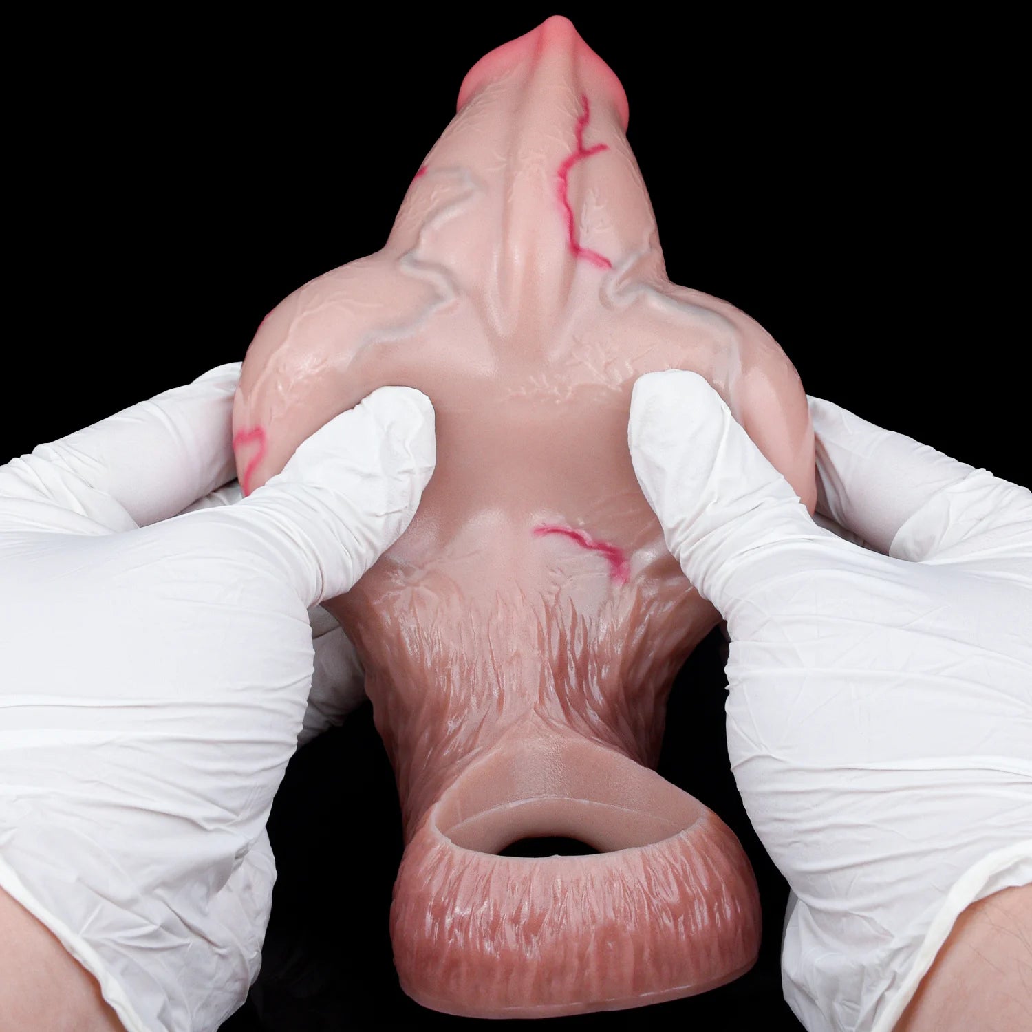 Pink translucent cock sleeve shown with open ring base and dog-shaped sheath tip.