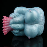 Side view of light blue animal Fleshlight with pink paw details and round rear end