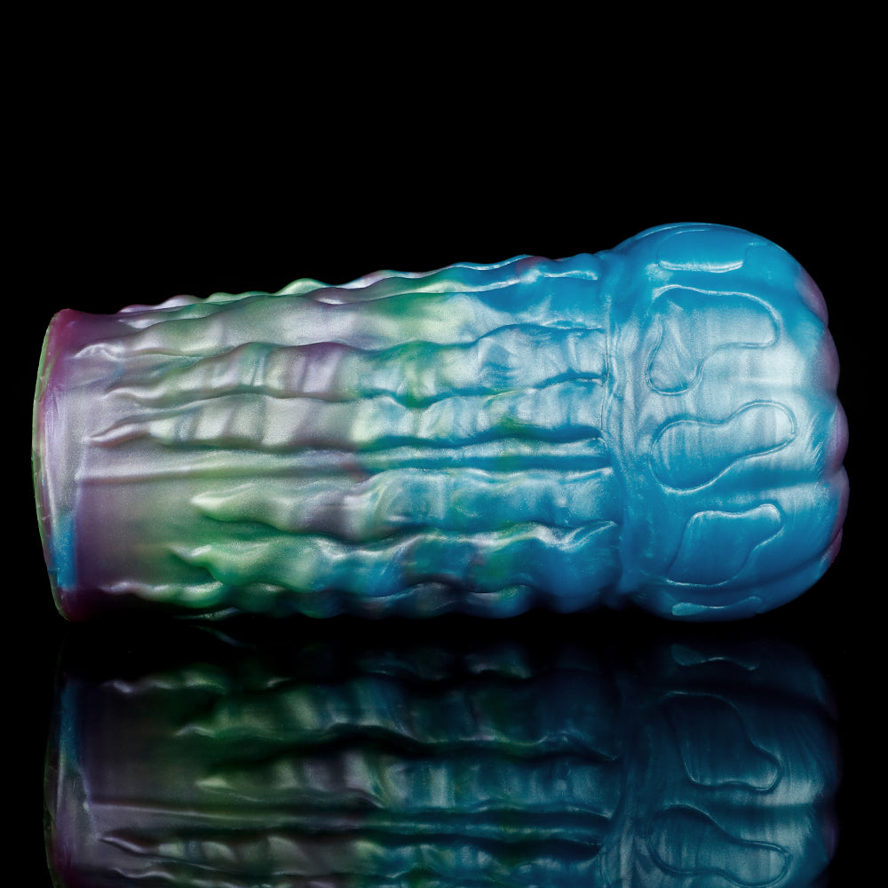 Alien fantasy male masturbator, detailed blue textured surface with green and purple highlights
