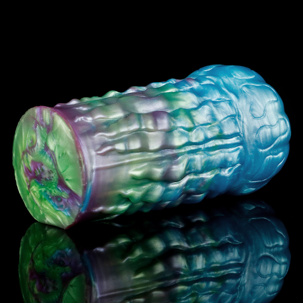 Alien fantasy male masturbator, rainbow iridescent body with detailed molded patterns