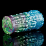 Alien fantasy male masturbator, rainbow iridescent body with detailed molded patterns